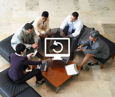 Businesspeople meeting in lobby