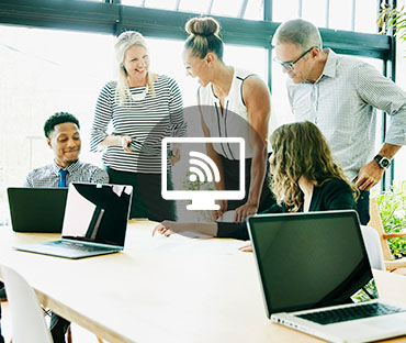 Laughing businesswoman working