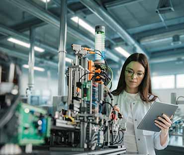 Scientist adjusting laboratory sorting machine