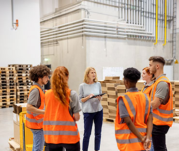Warehouse manager talking