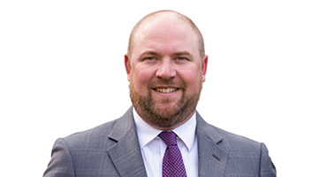 Headshot of Kyle McGuire