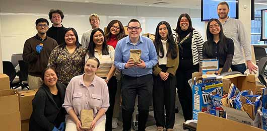 Ema working with team